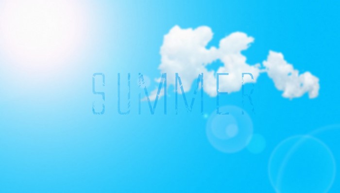 Summer text on a blue sky with clouds