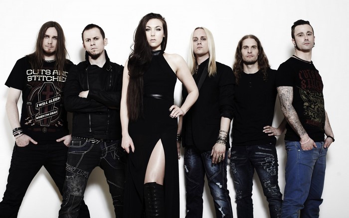 Amaranthe band members posing for a photo
