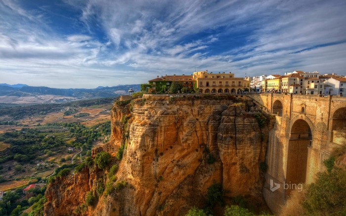 Puente Nuevo bridge and buildings on a cliff in Ronda, Spain