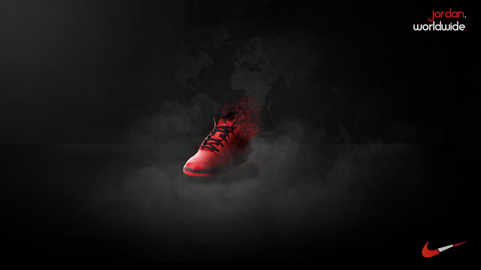 Red Jordan shoe dissolving into particles