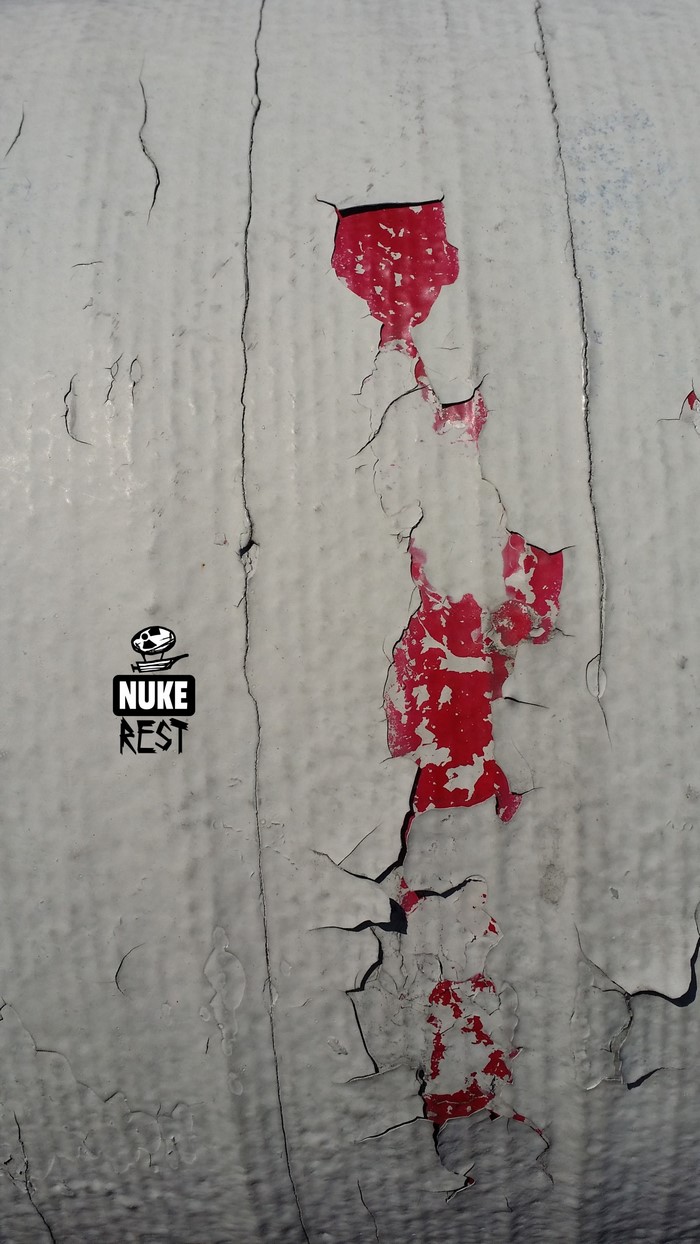 Peeling paint with NUKE REST logo