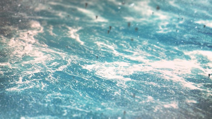 Abstract ocean waves with sunlight and particles