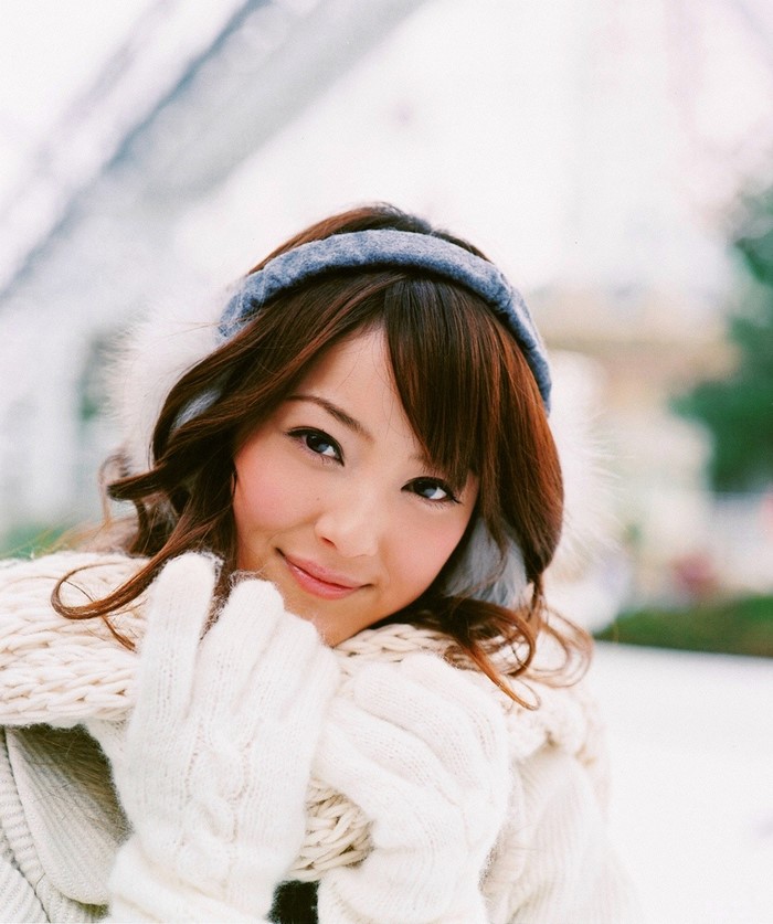 Sasaki Nozomi wearing earmuffs and scarf in winter