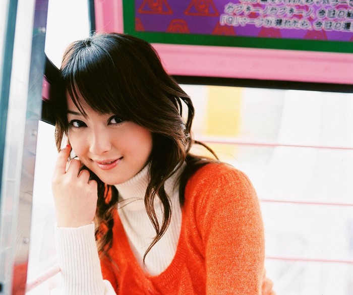 Sasaki Nozomi in orange sweater