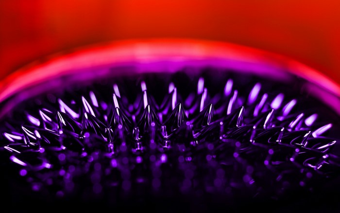 Ferrofluid spikes in purple and red light