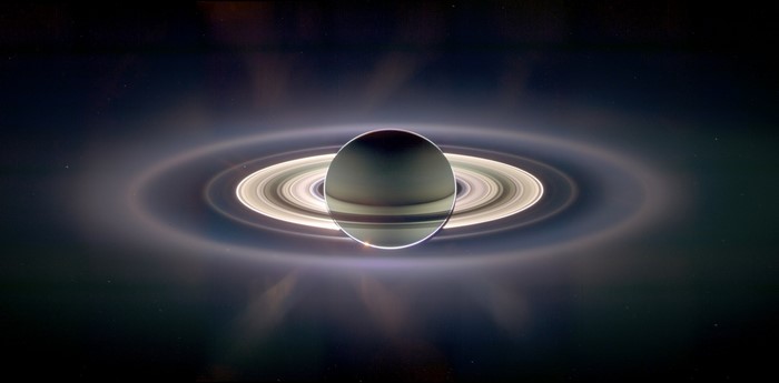 Saturn and its rings in space