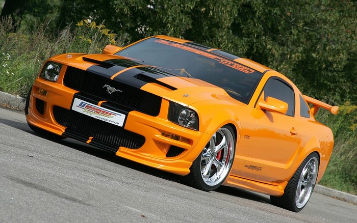 Orange Ford Mustang GT500 with black stripes