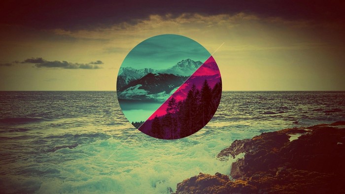 Geometric circle over ocean and mountains