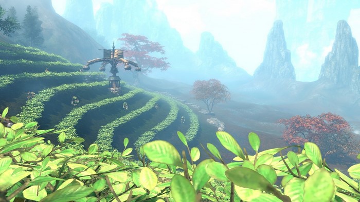 Terraced fields with a structure and mountains
