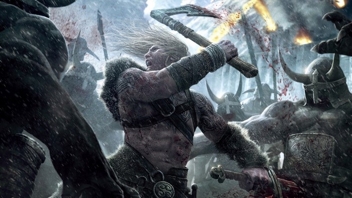 Viking warrior in battle with axe and sword