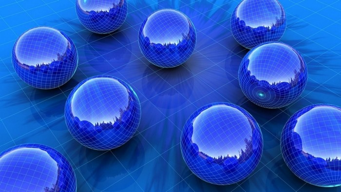 Blue spheres on a grid background with reflections