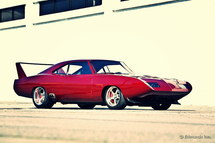 Red Dodge Charger Daytona with a large rear wing