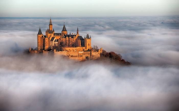 Burg Hohenzollern castle above clouds in Germany