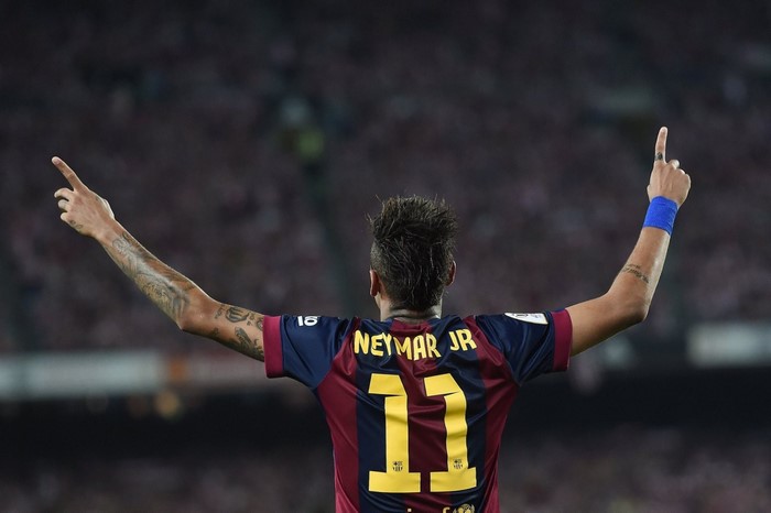 Neymar Jr. celebrating with arms outstretched