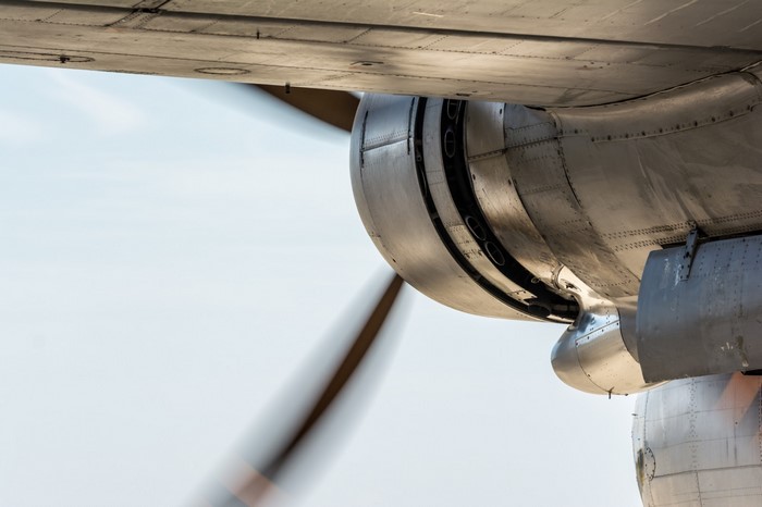 Close-up of an airplane engine and wing