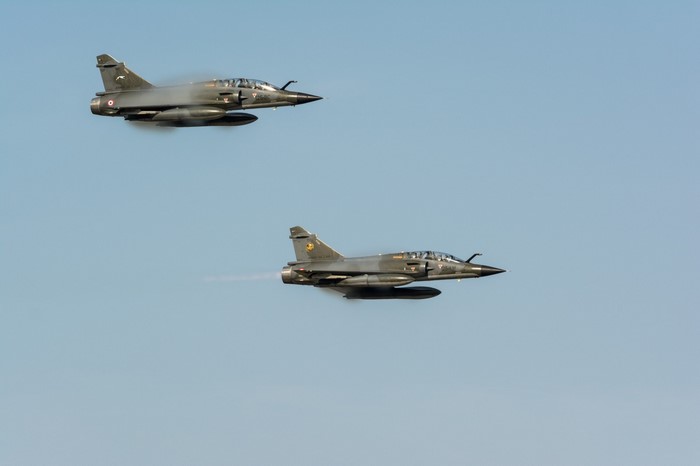 Two French Air Force Mirage 2000 fighter jets in flight