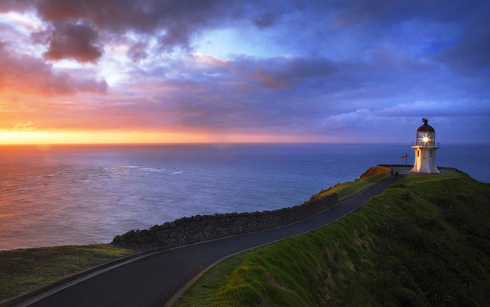 Sunset by the Lighthouse on a Coastal Path