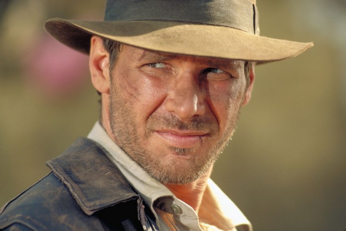 Harrison Ford as Indiana Jones wearing a hat and jacket