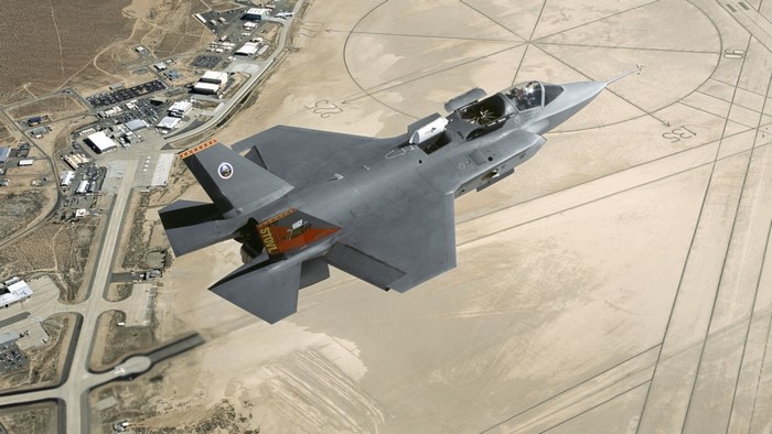 Lockheed Martin F-35 Lightning II over an airbase