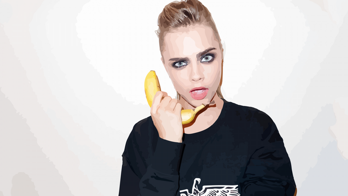 Cara Delevingne holding a banana to her ear