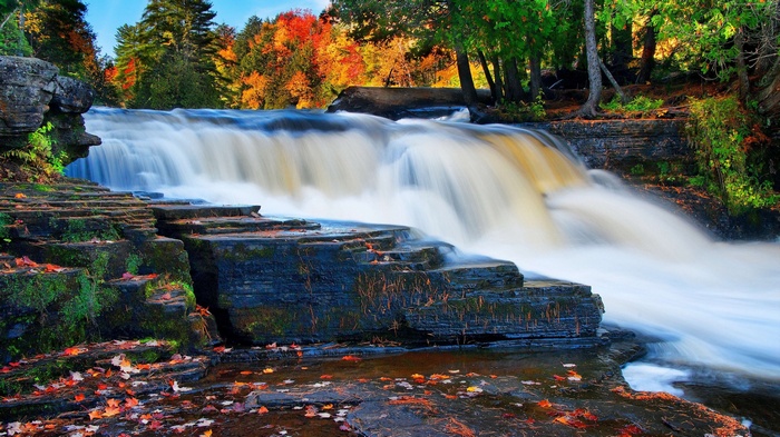 Waterfall in autumn forest