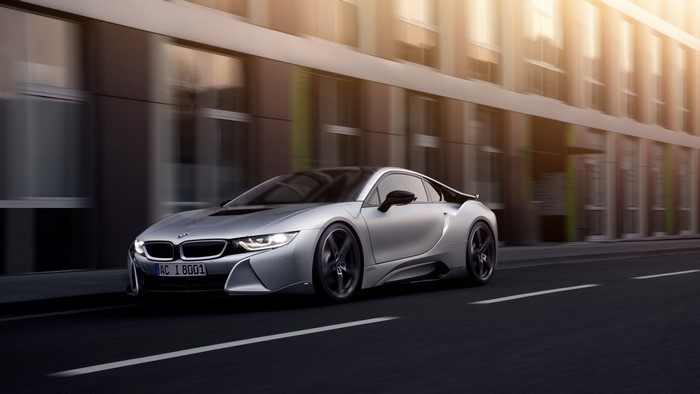 Silver BMW i8 AC Schnitzer driving on a city street