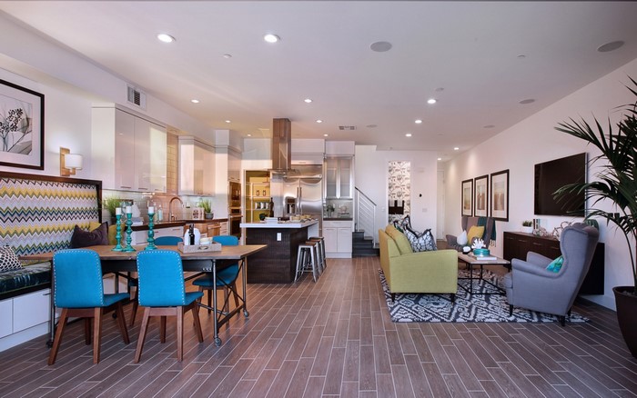 Modern open-plan living room, dining area, and kitchen