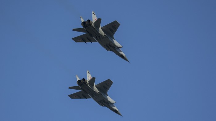 Two Mikoyan MiG-31 fighter jets flying in formation