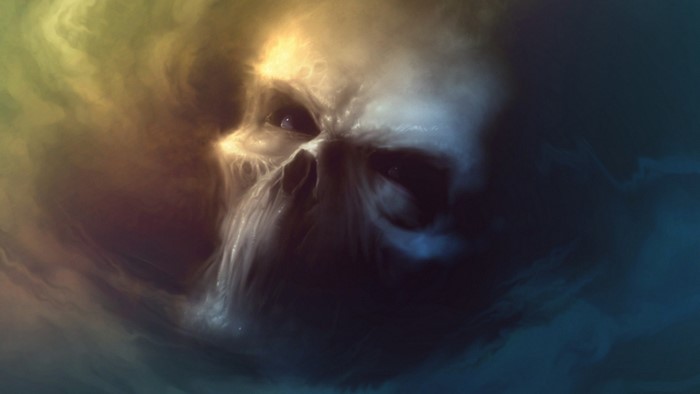 Skull emerging from colorful clouds