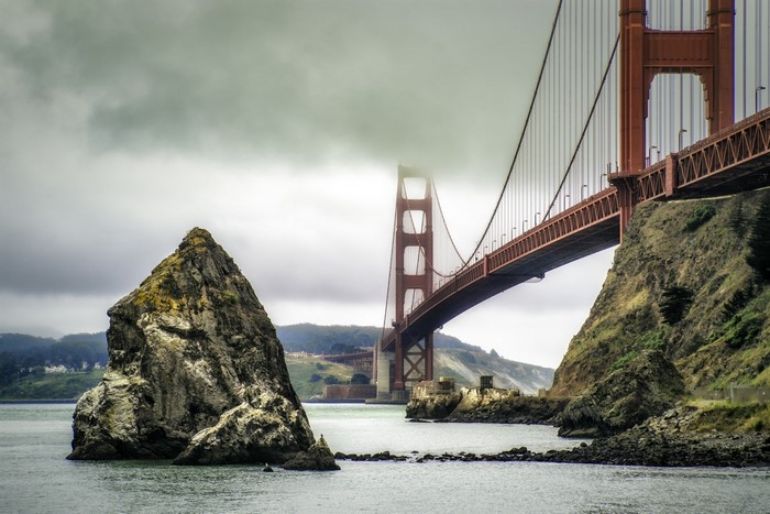 Golden Gate Bridge and rock formation in the bay