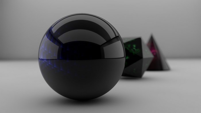 Black sphere and geometric shapes with reflections