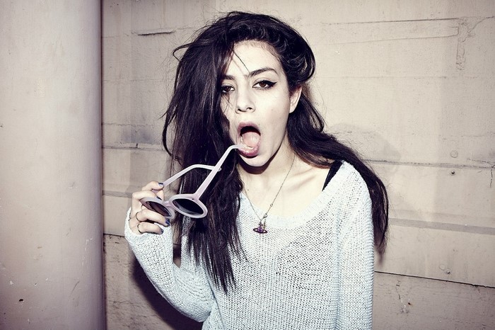Charli XCX with sunglasses in portrait photography