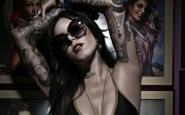 Kat Von D with tattoos and sunglasses