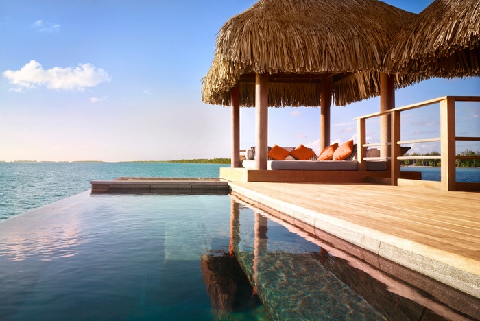 Infinity Pool and Gazebo Overlooking Tropical Ocean