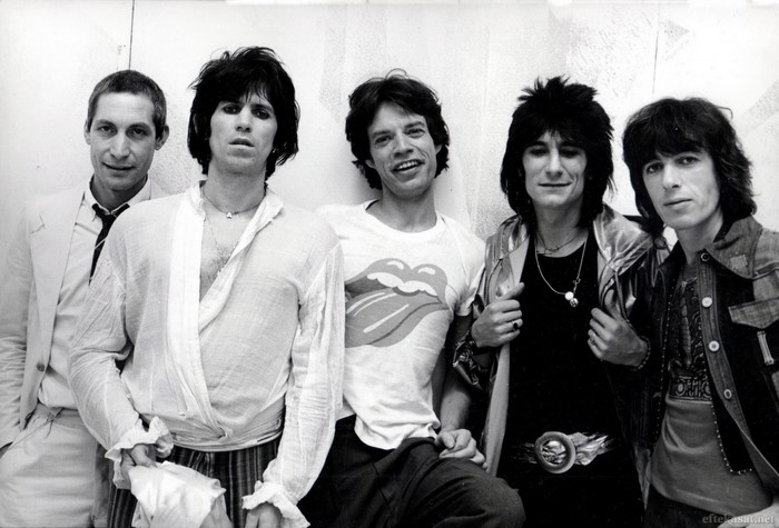 The Rolling Stones band members posing for a photo