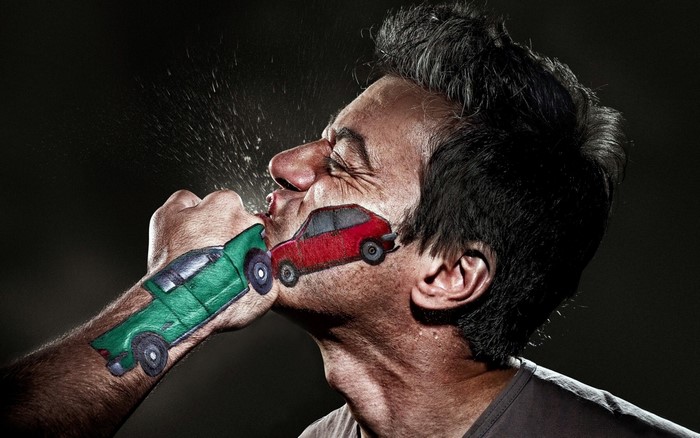 Man with car tattoos getting punched in face