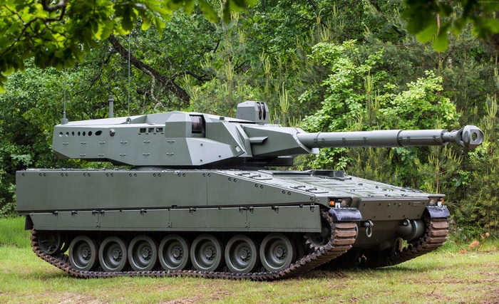 CV90105 light tank in a forest setting
