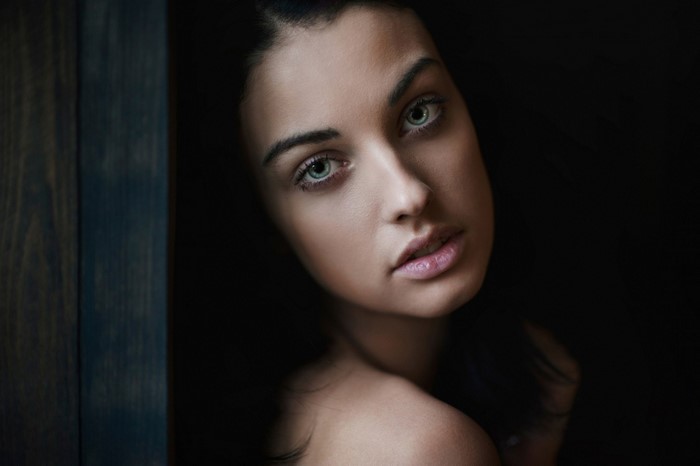 Portrait of a woman with green eyes by Alla Berger