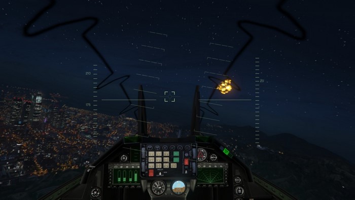 Cockpit view of a jet over a city at night