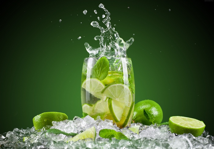 Mojito cocktail with lime and mint in ice