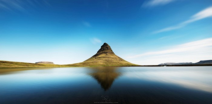 Kirkjufell mountain reflected in water, Iceland