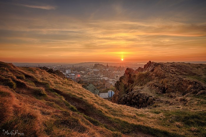 Sunset over Edinburgh city from Arthur's Seat