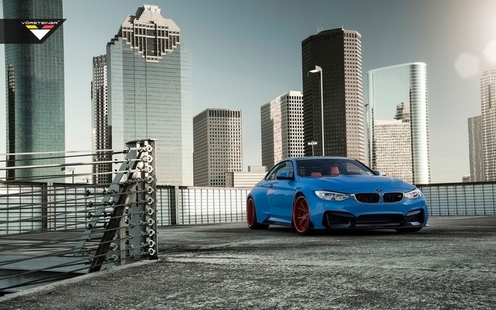 Blue BMW M4 GTRS4 by Vorsteiner with red wheels