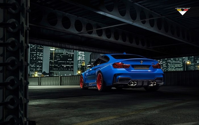 Blue BMW M4 GTRS4 with red wheels by Vorsteiner