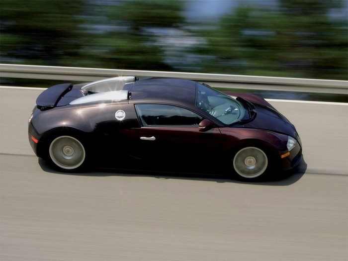 Bugatti Veyron driving on a road