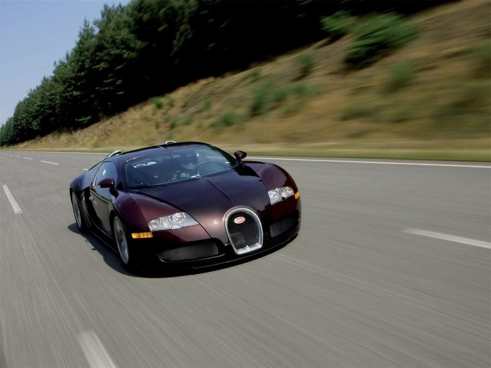Bugatti Veyron driving on a road