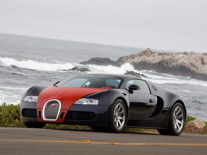 Bugatti Veyron sports car on a coastal road