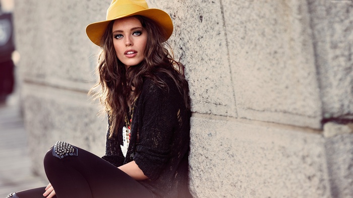 Emily Didonato wearing a yellow hat and black sweater