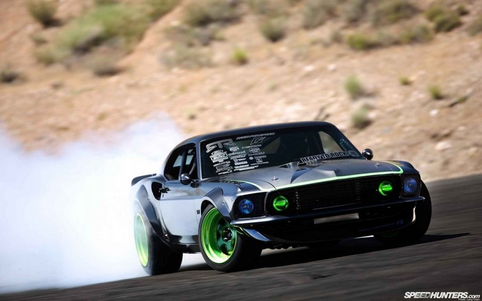 Ford Mustang drifting with smoke