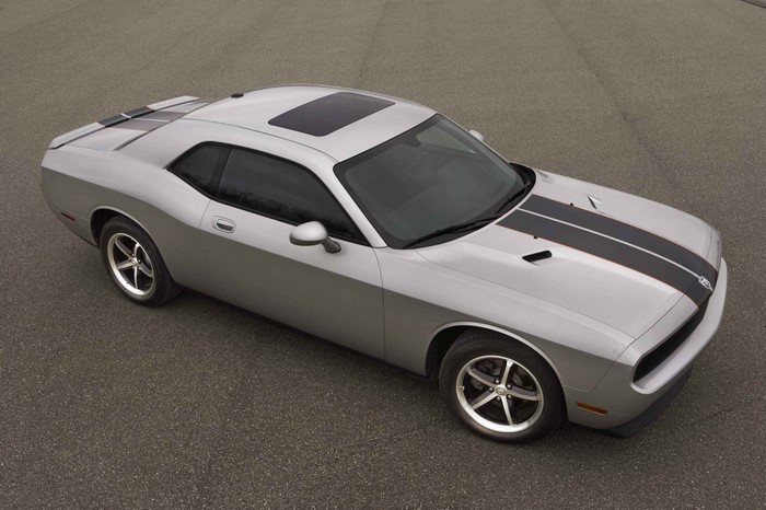 Silver Dodge Challenger with racing stripes and sunroof